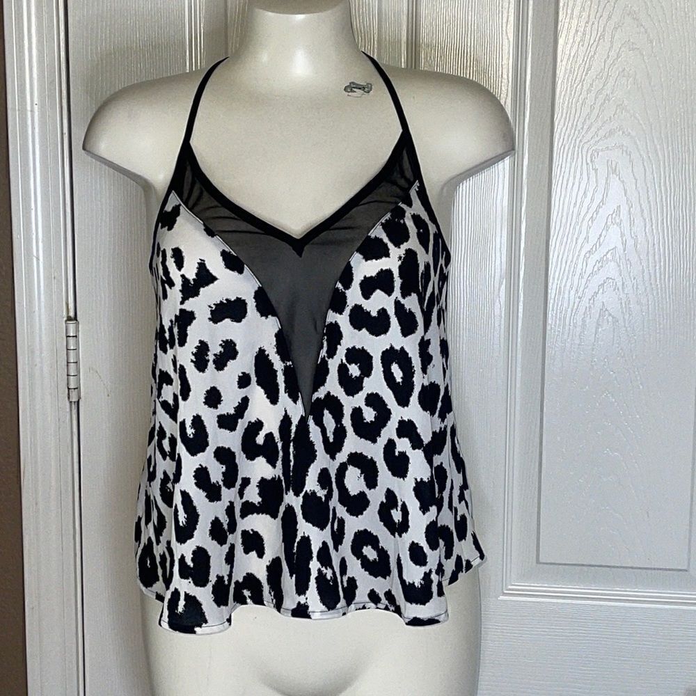 Express black and white cheetah print top size xs